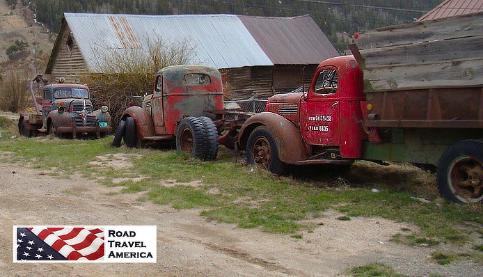 Old, red trucks at rest in Silverton, Colorado
