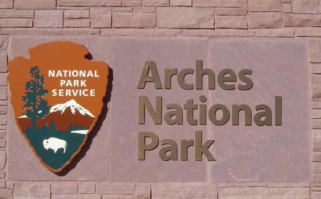 Sign at the entrance to Arches National Park, Moab, Utah Sign at the entrance to Arches National Park, Moab, Utah